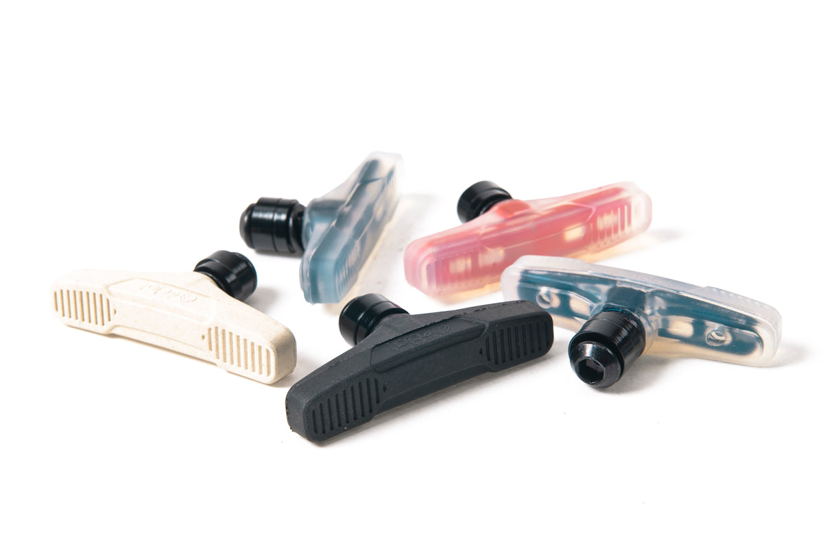 Eclat Force Bremsbacken / Brake Pads Clear/Orange